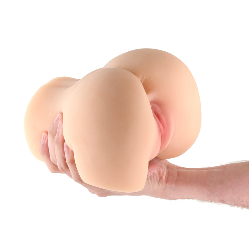 Barely Legal Hazel - Tan - Tan Mini Doggy-Style Masturbator in hand, showcasing its lifelike soft texture.