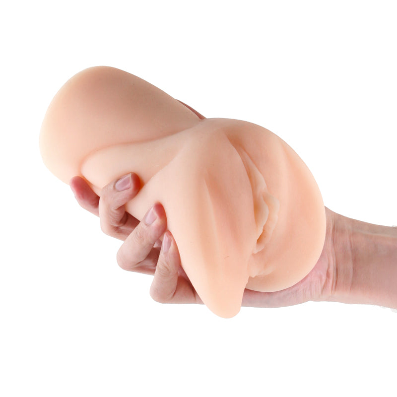 Barely Legal Jasmine - White -  Vagina Stroker held in hand, showcasing its realistic design and texture for intimate essentials.