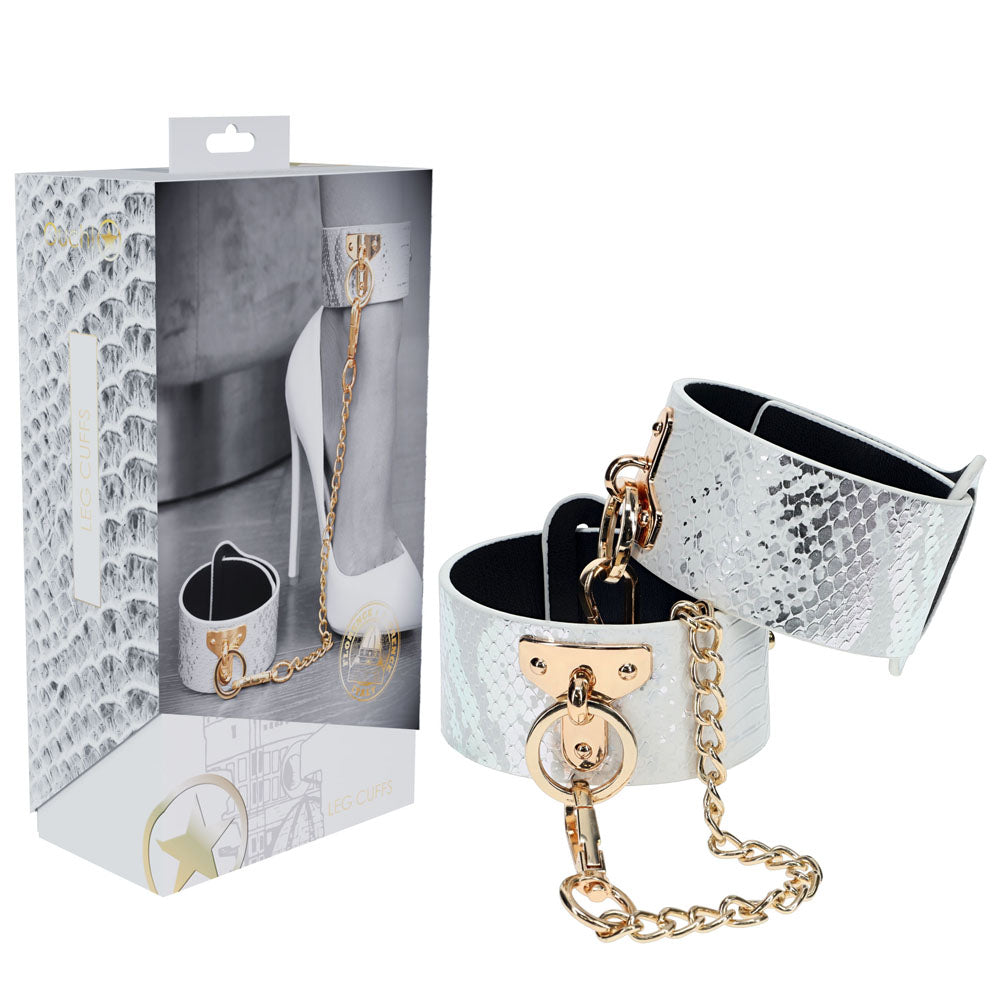 OUCH! Florence Collection - Leg Cuffs - Restraints with silver snake print and gold hardware in packaging.