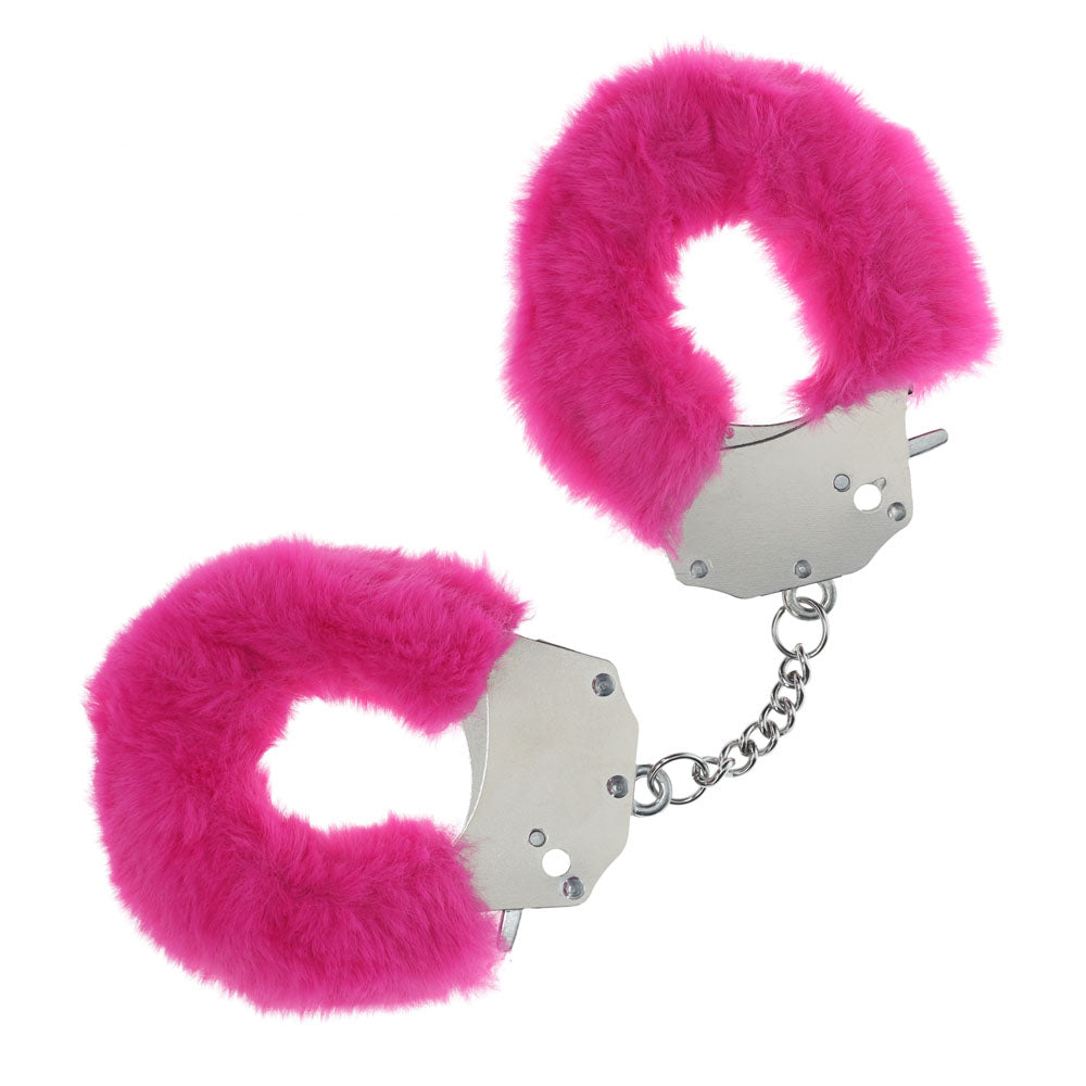 Heavy-duty fluffy handcuffs in vibrant pink with soft fur for playful and exciting bedroom adventures.