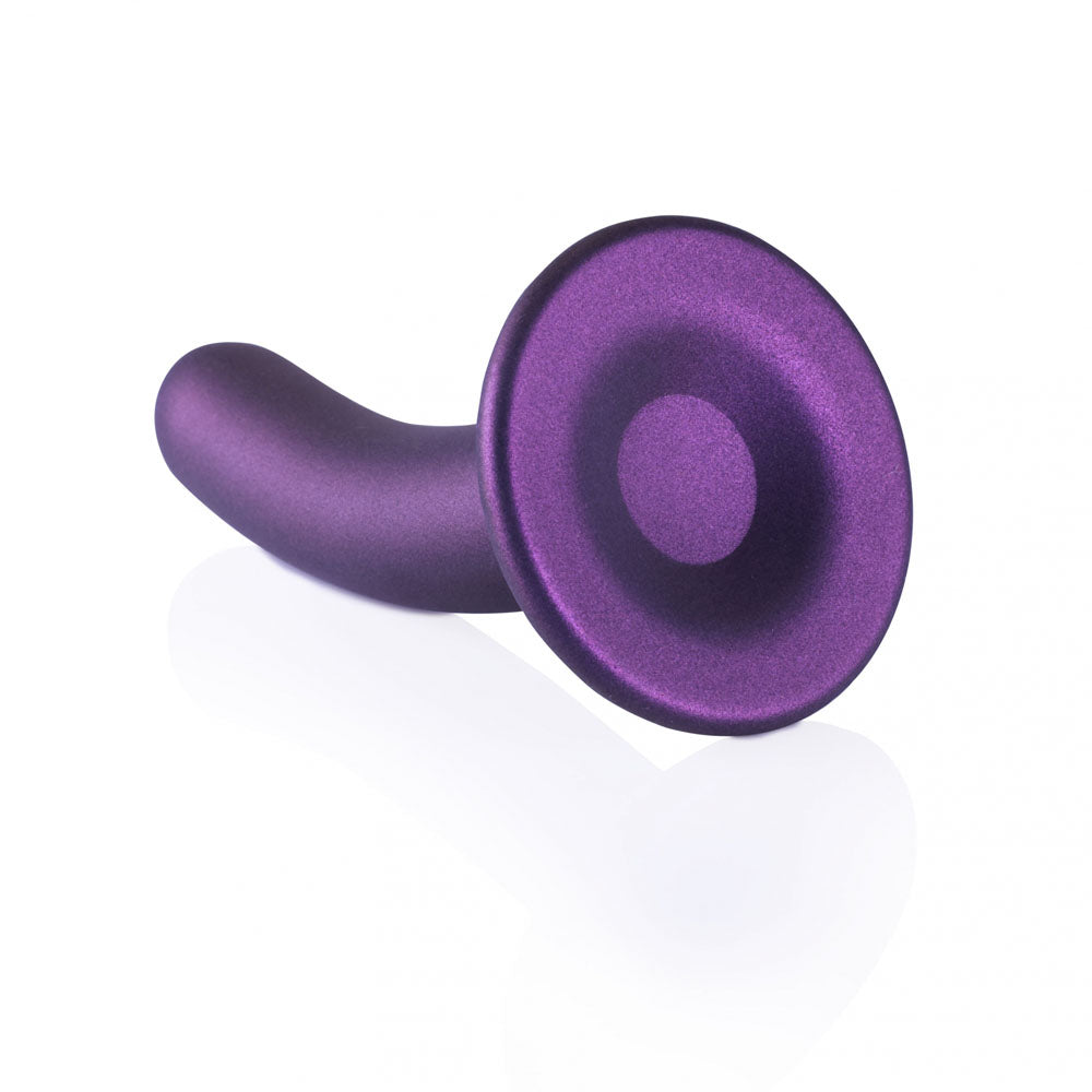 Smooth silicone g-spot dildo in purple with a strong suction cup for versatile pleasure.
