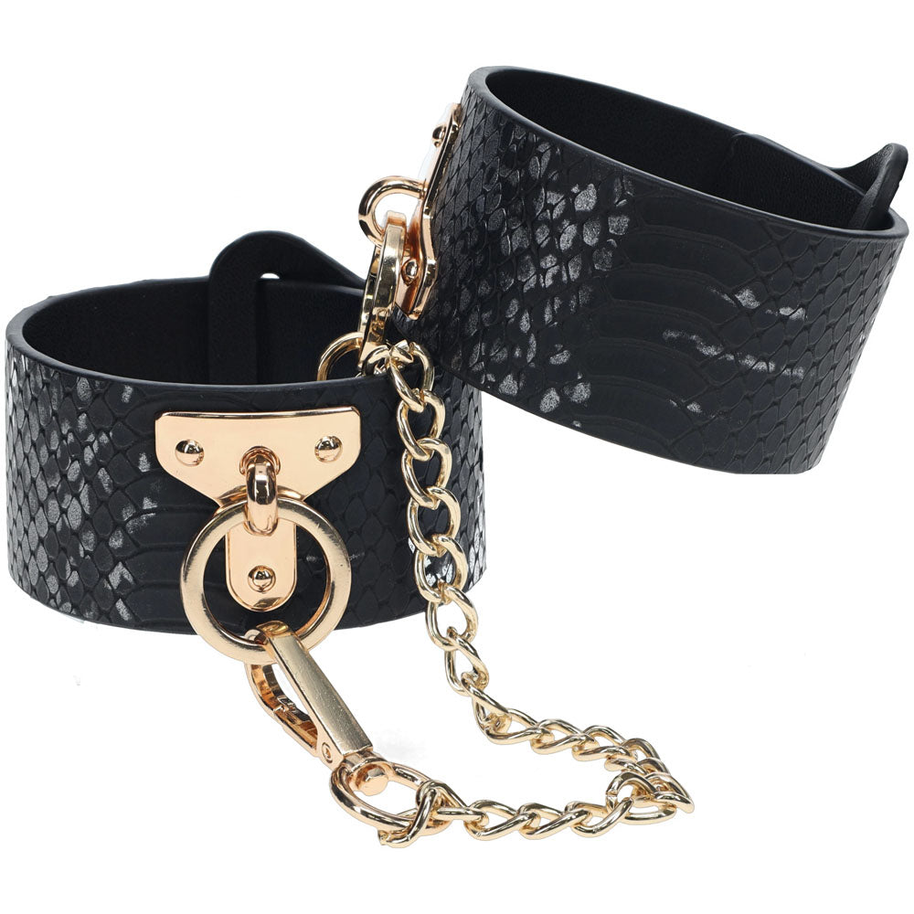 OUCH! Florence Collection - Handcuffs - Restraints featuring sleek black bonded leather and iridescent hardware for a stylish look.