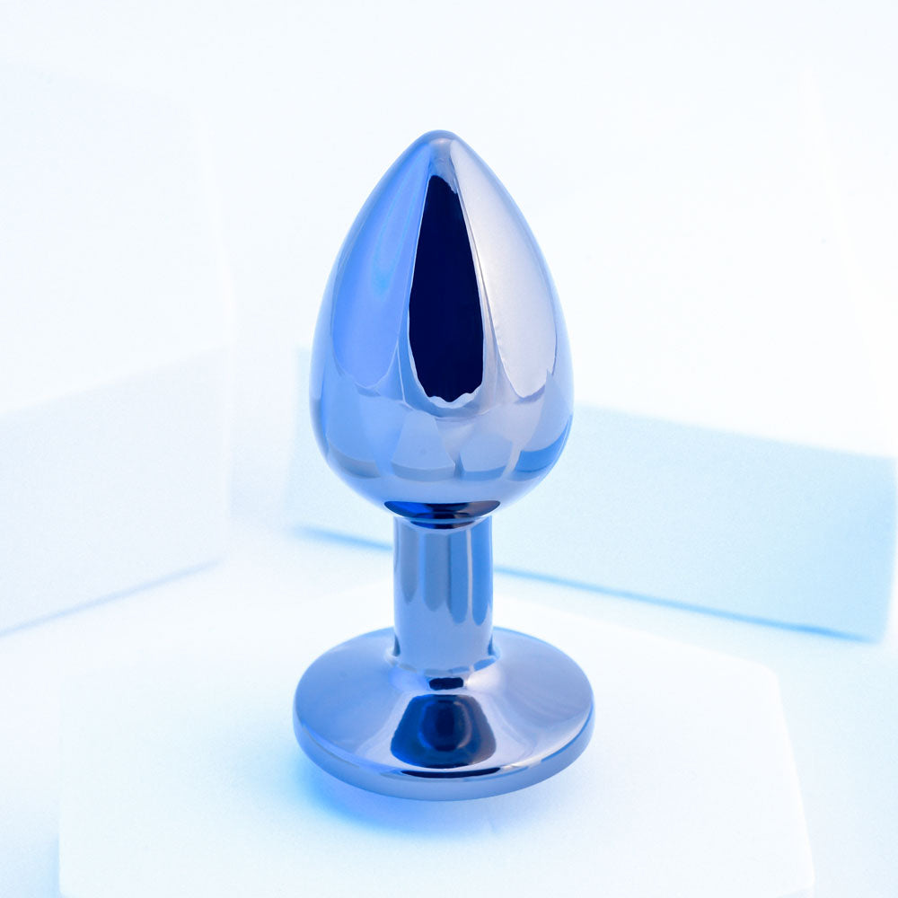 Playboy Pleasure TUX - Small - Metal 7.4 cm Small Butt Plug on a light background.