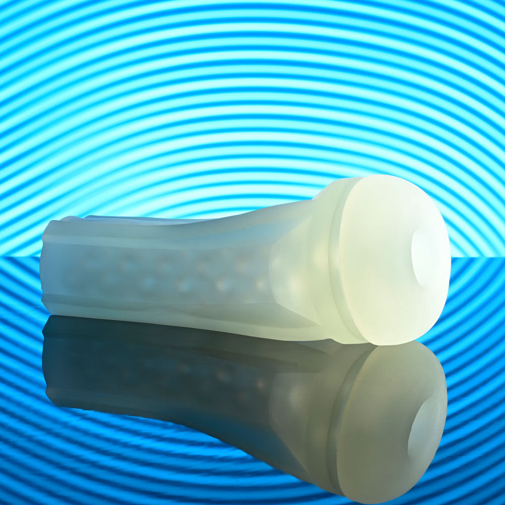 Playboy Pleasure THE URGE MEDIUM - Clear Stroker showcasing soft, textured design against a vibrant blue background.