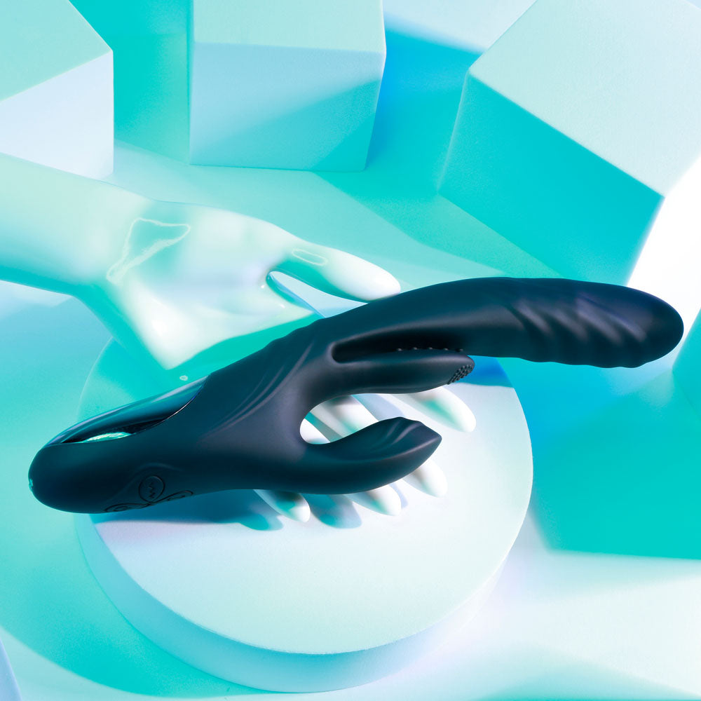 Playboy Pleasure RAPID RABBIT - 26.4 cm USB rechargeable rabbit vibrator on a stylish display.