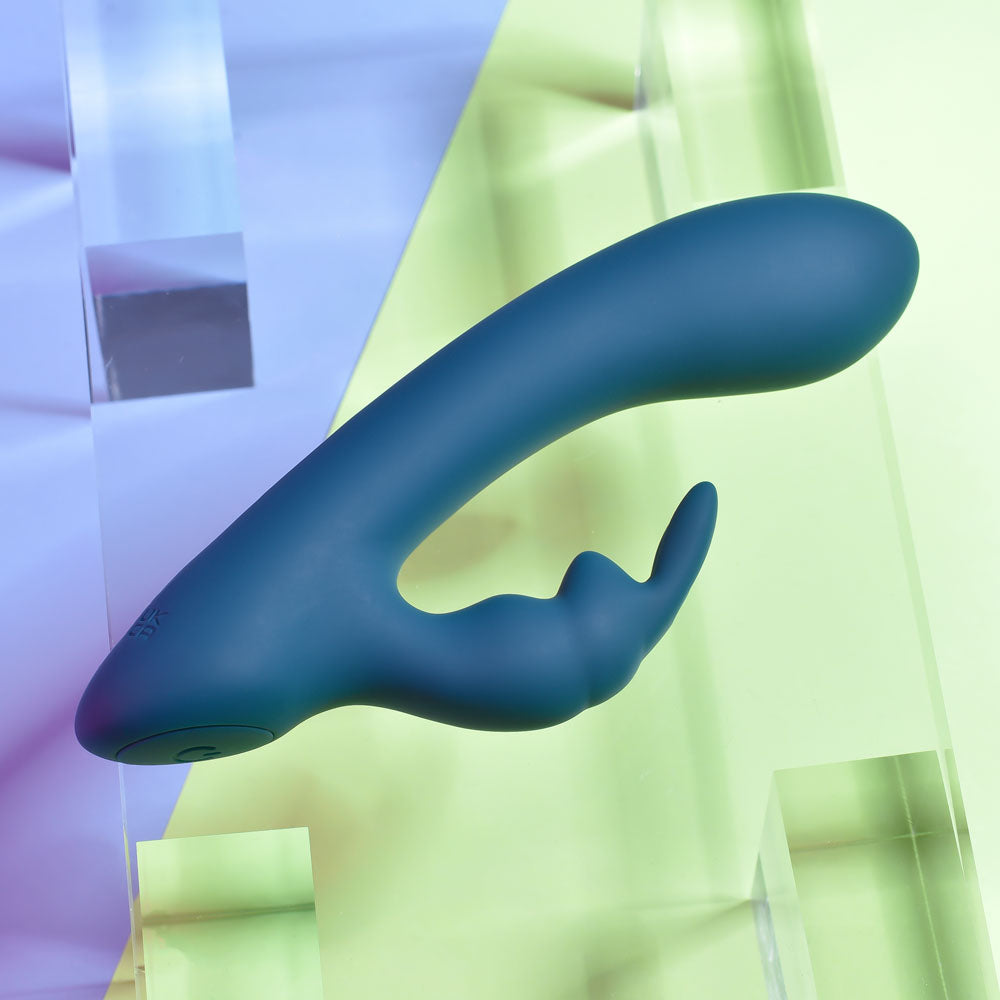 Playboy Pleasure LIL RABBIT - Deep Teal 14.6 cm USB Rechargeable Rabbit Vibrator on colorful background