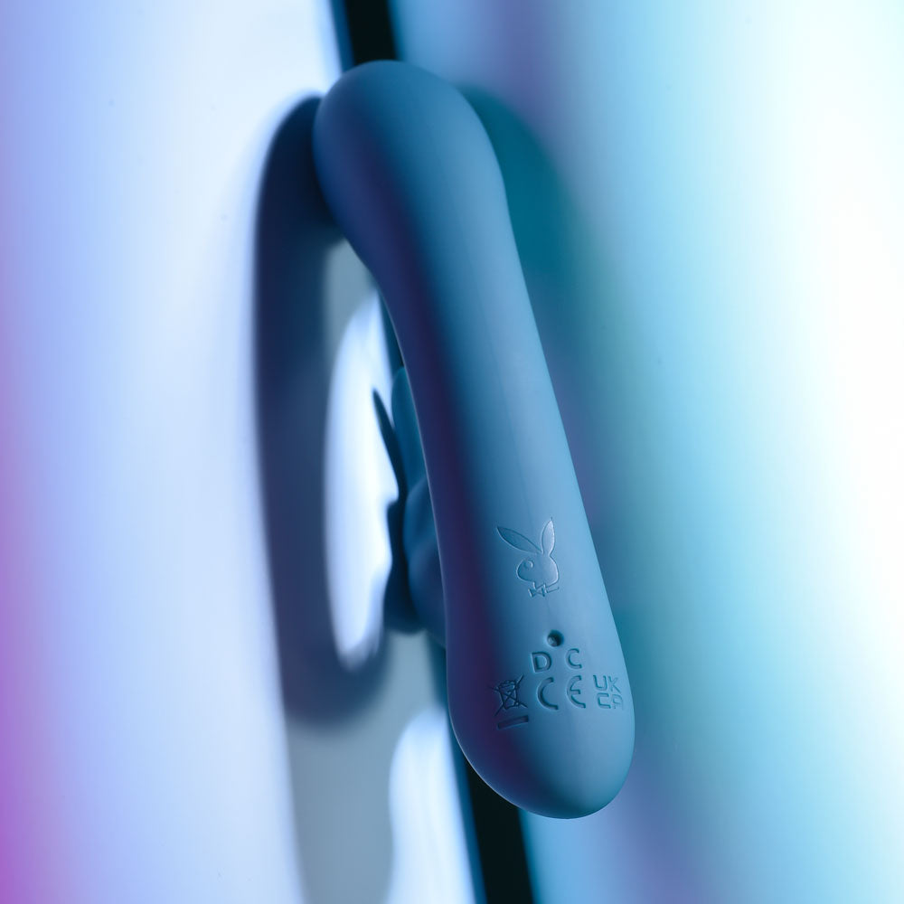 Playboy Pleasure LIL RABBIT - Deep Teal 14.6 cm USB Rechargeable Rabbit Vibrator on a sleek surface.