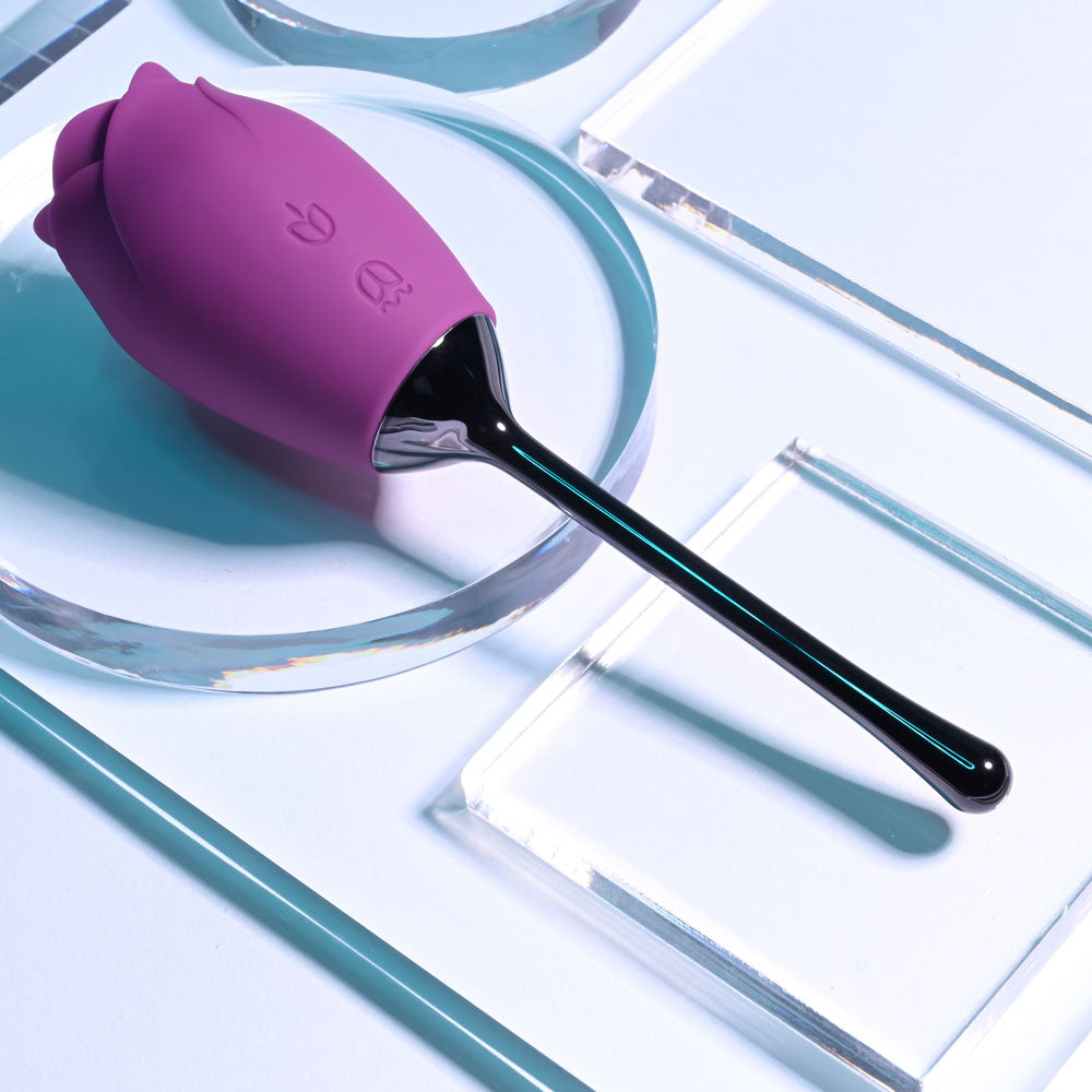 Playboy Pleasure PETAL - USB Rechargeable Flicking Stimulator on a sleek background for intimate essentials.