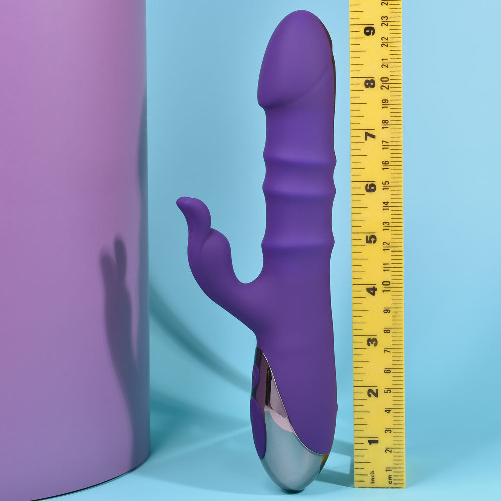 Playboy Pleasure HOP TO IT - 23.5 cm USB Rechargeable Rabbit Vibrator displayed next to a ruler for size reference.