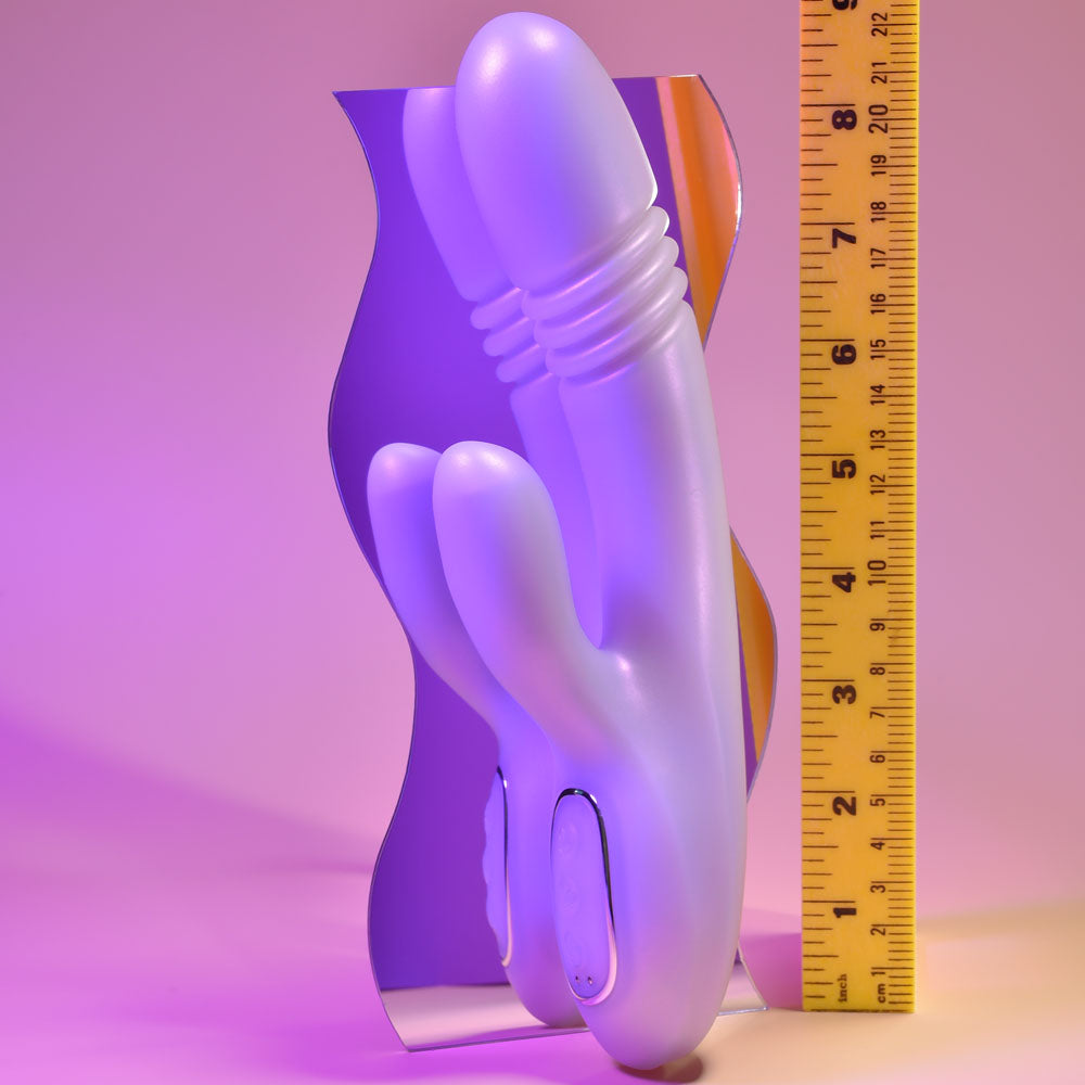 Playboy Pleasure BUMPING BUNNY - Opal 22.9 cm USB Rechargeable Thrusting & Warming Rabbit Vibrator next to measurement ruler.