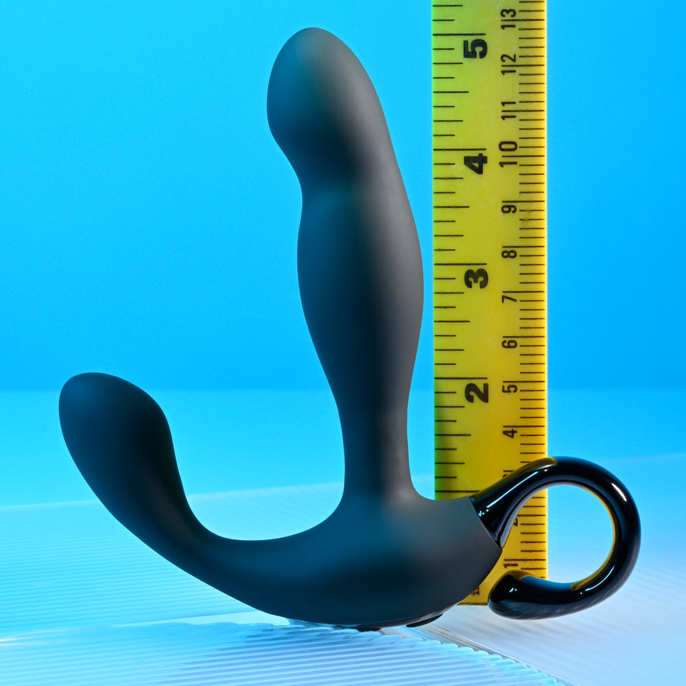 Playboy Pleasure COME HITHER - 13.2 cm USB Rechargeable Vibrating Prostate Massager with Wireless Remote Control next to a ruler for size reference.