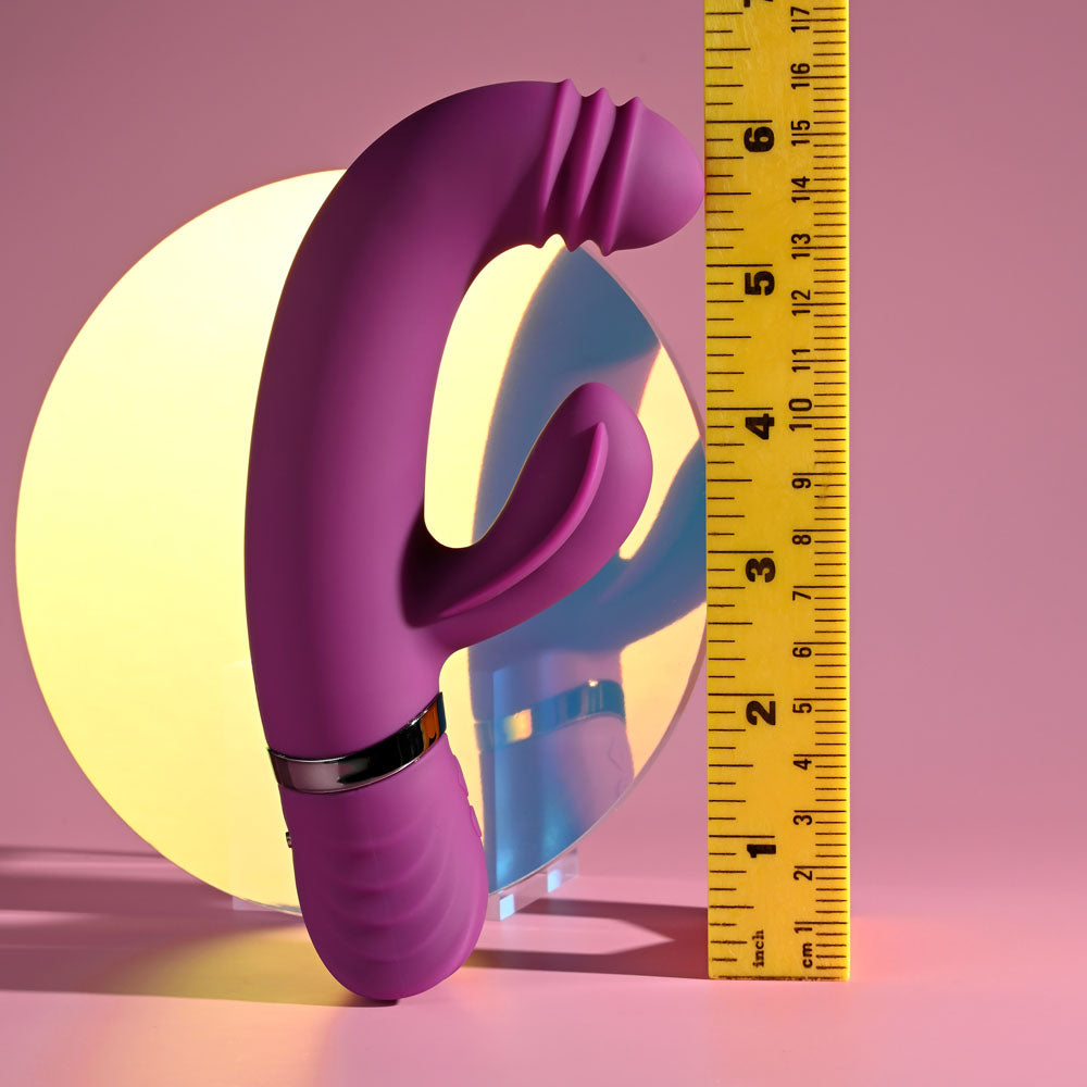 Playboy Pleasure TAP THAT - 16.5 cm USB Rechargeable Rabbit Vibrator displayed with a measuring tape.