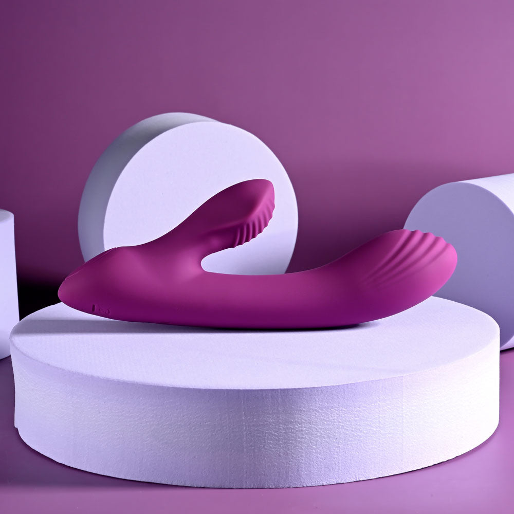 Playboy Pleasure BITTY BUNNY, a USB rechargeable rabbit vibrator, designed for G-Spot and clitoral stimulation.