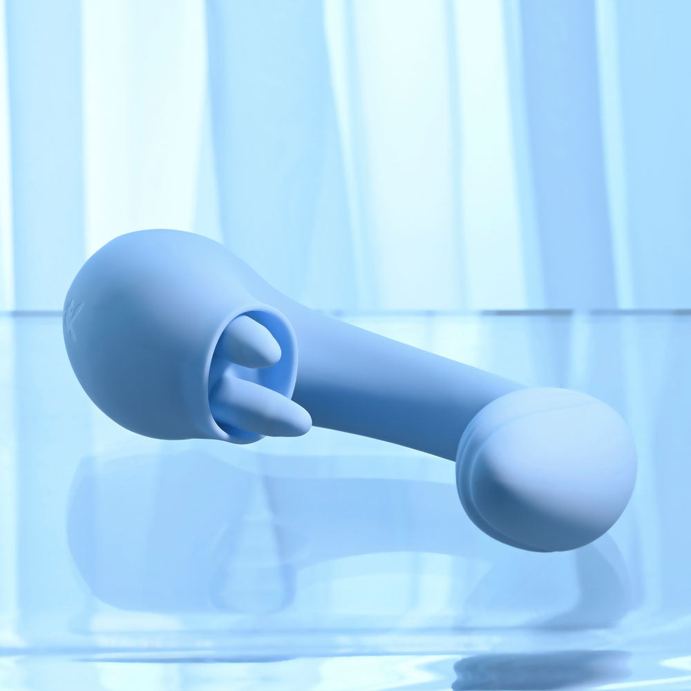Playboy Pleasure SAPPHIRE SKY - 21.6 cm USB Rechargeable Vibrator with Double Tongue Stimulator on a blue background.