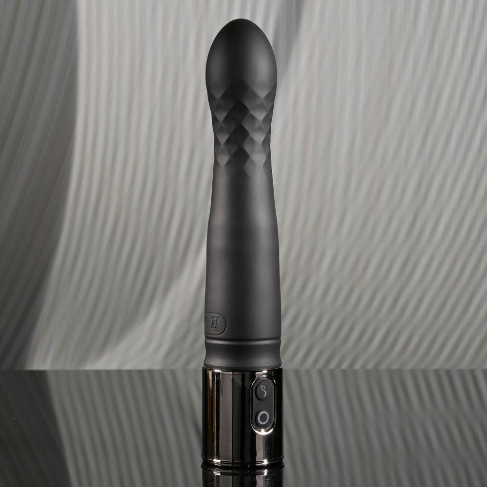Playboy Pleasure PLEASURE ZONE - 21.4 cm Rechargeable Vibrator with USB Charging Dock on reflective surface
