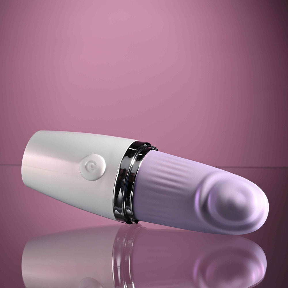 Playboy Pleasure GETAWAY - White/ 14.2 cm USB Rechargeable Tapping Stimulator on a reflective surface.