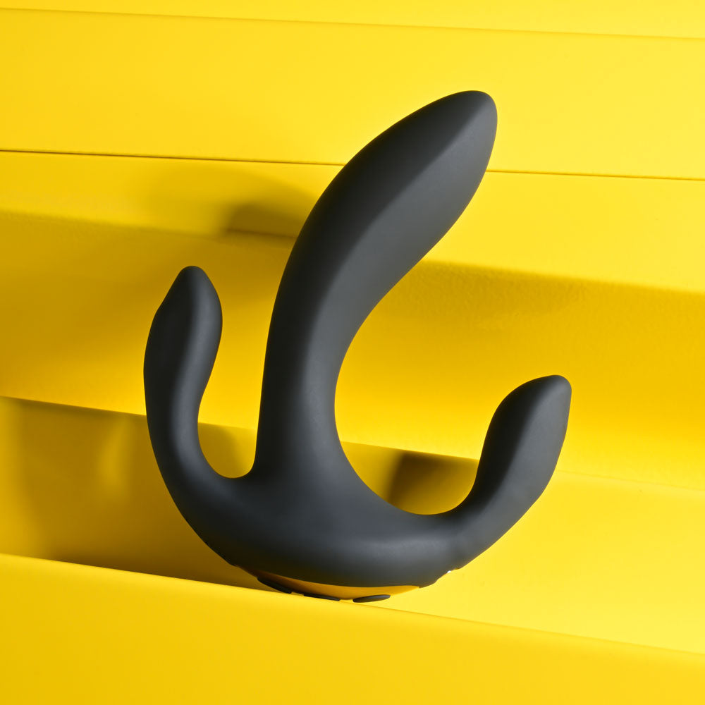 Playboy Pleasure TRIPLE THREAT - USB rechargeable triple probe vibrator on a vibrant yellow background.