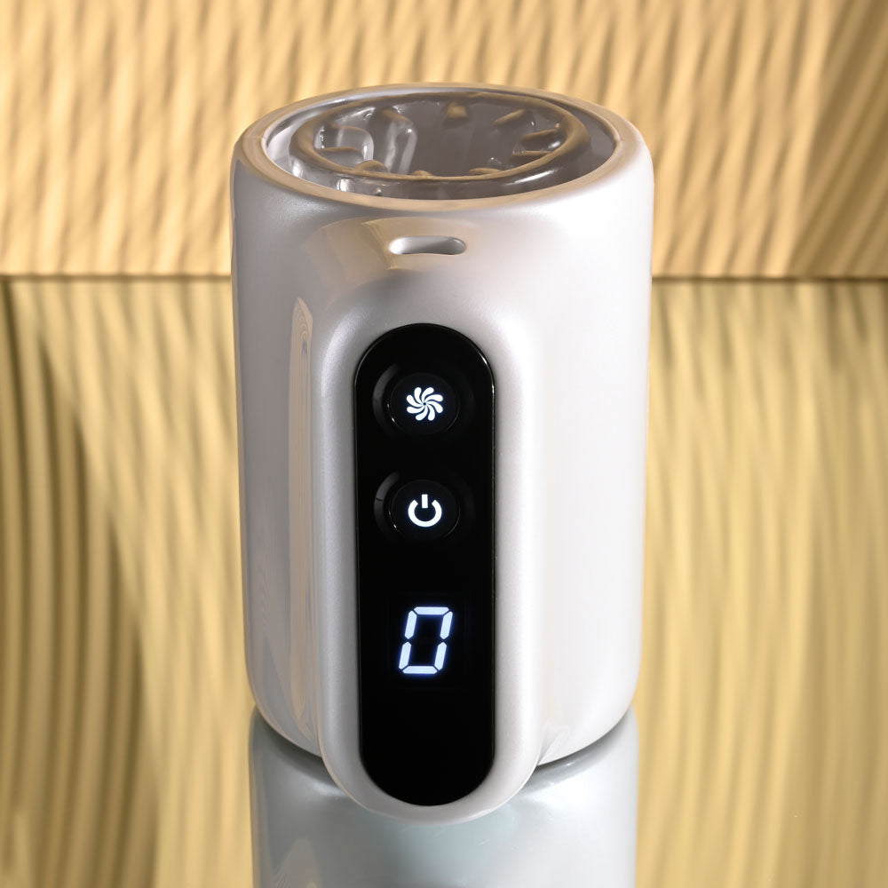 Playboy Pleasure SPIN DOCTOR - USB rechargeable vibrating stroker with ergonomic controls and sleek design.