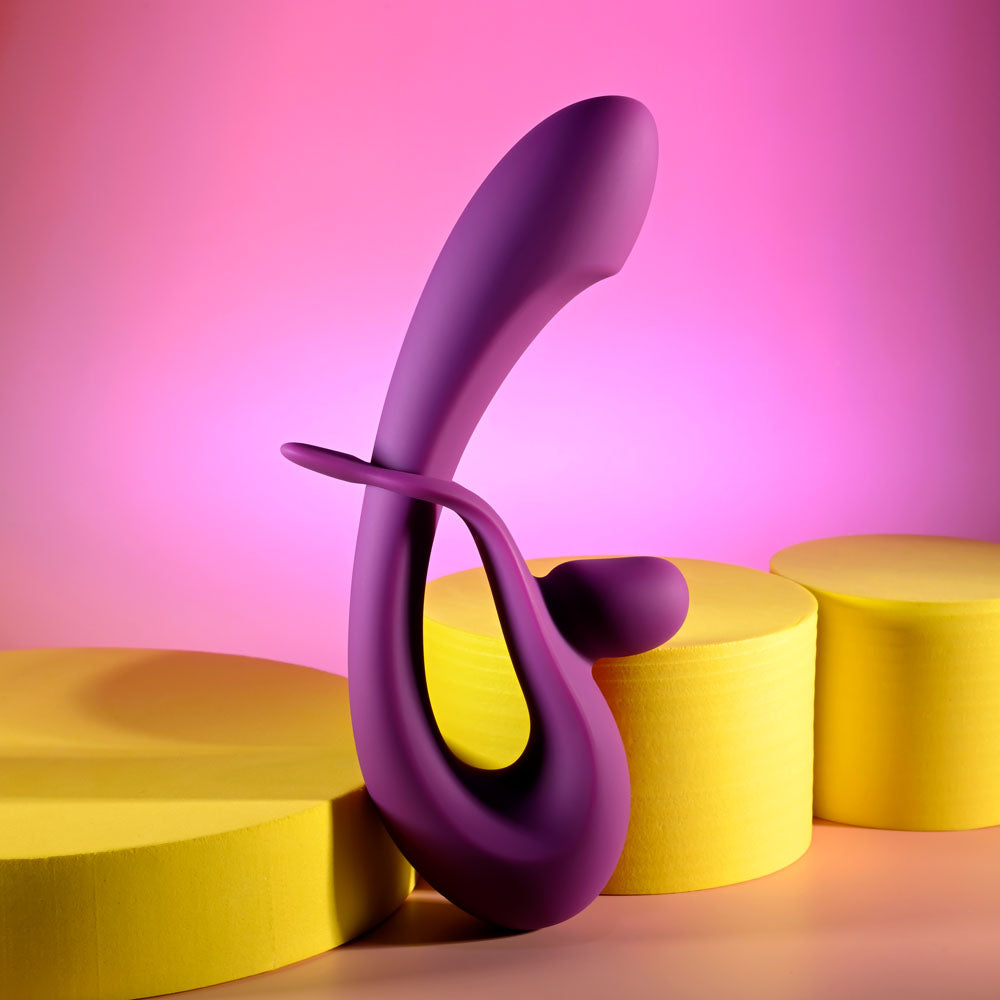 Playboy Pleasure CHA CHA SLIDE -  20 cm USB Rechargeable Rabbit Vibrator on colorful background