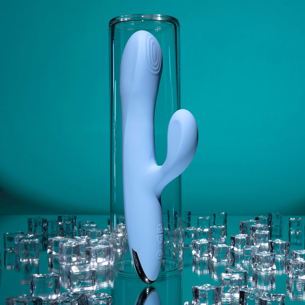 Playboy Pleasure UP AND AWAY USB rechargeable rabbit vibrator in clear casing with ice cubes.