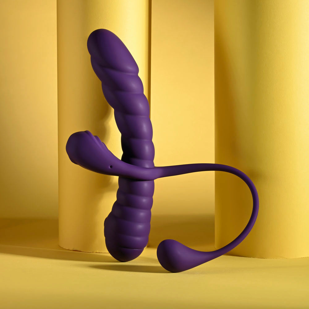Playboy Pleasure TWISTED PLAYGROUND - USB Rechargeable Vibrator and Cock Ring Kit displayed on vibrant yellow background.