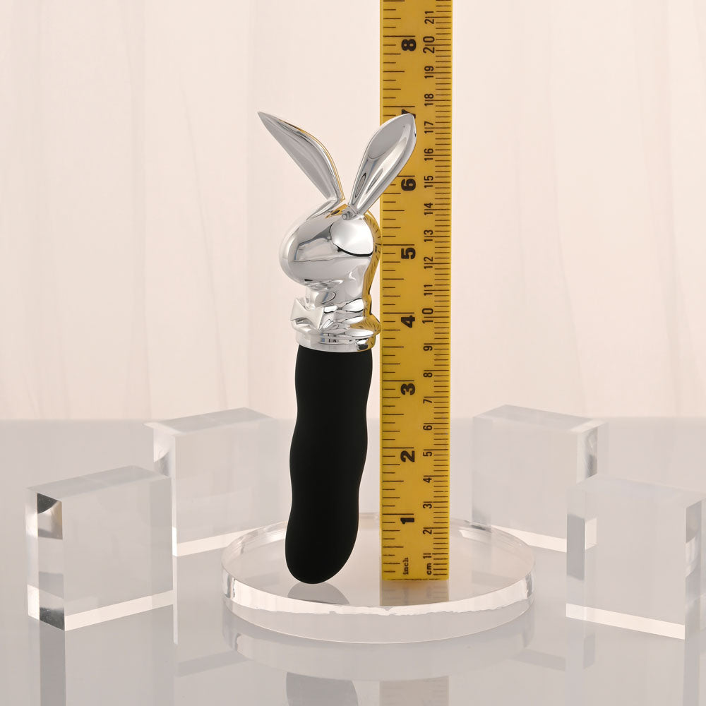 Playboy Pleasure BUNNY ON THE GO - /Chrome 18.6 cm USB-C Rechargeable Vibrator on display with measuring ruler.