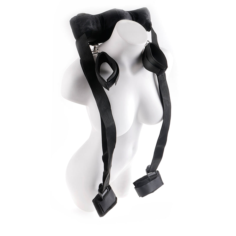 Fetish Fantasy Series Position Master restraint set with cuffs displayed on a mannequin torso, emphasizing the adjustable straps.