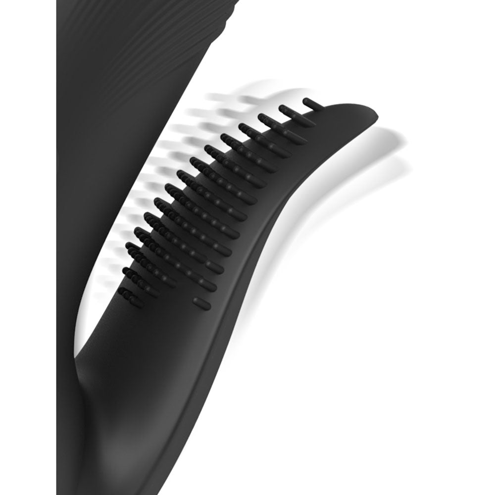 Fetish Fantasy Series Pogo Thruster - USB Rechargeable 23.5 cm Gyrating Rabbit Vibrator close-up showing textured surface for enhanced pleasure.
