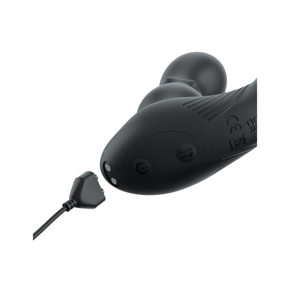 USB rechargeable prostate massage toy with pleasure pearls and charging port for enhanced stimulation.
