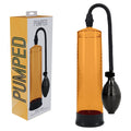PUMPED Basic Pump 1 - Orange - Orange Penis Pump with packaging, designed for enhancing erections and intimacy.