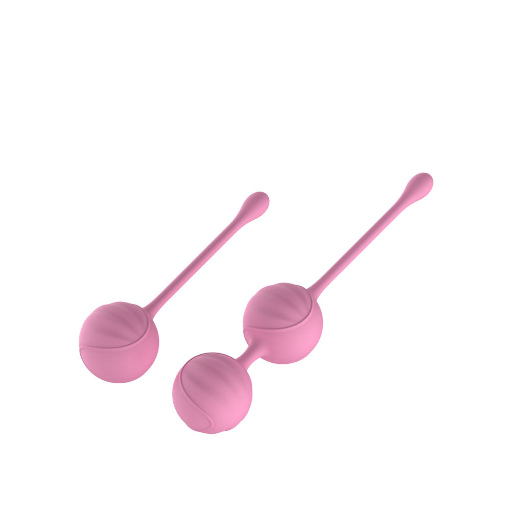 Passion Play Silicone Kegel Ball Set in soft pink color, perfect for pelvic floor training and body awareness.