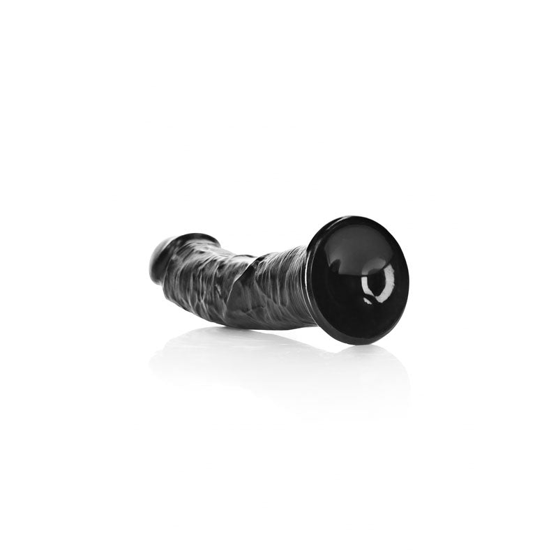REALROCK Realistic Regular Curved Dildo with Suction Cup - 18 cm -  18 cm (7'') Dong on a reflective surface.