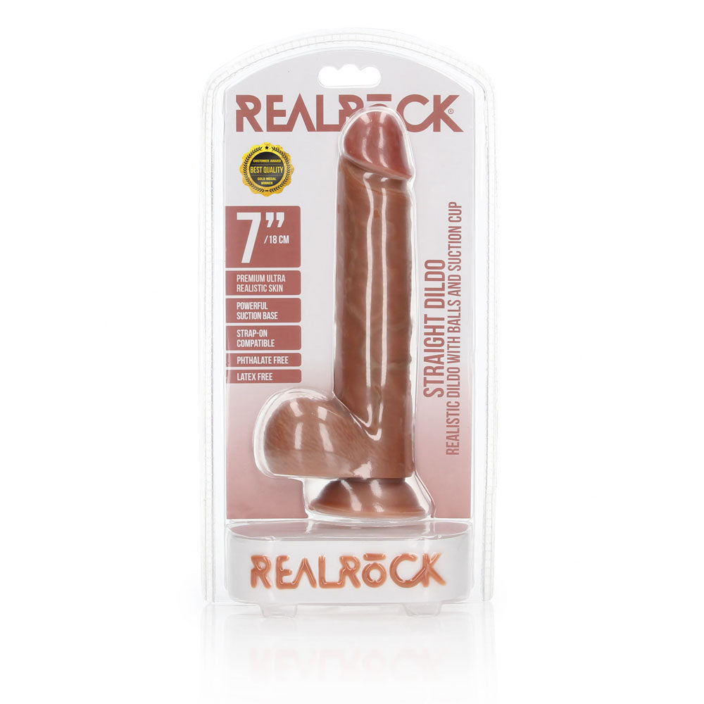 REALROCK Straight Realistic Dildo with Balls - 18 cm - Tan 18 cm (7'') Dong in packaging for intimate essentials.