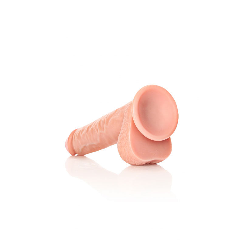 REALROCK Straight Realistic Dildo with Balls - 25.5 cm -  25.5 cm (10'') Dong, realistic dildo showcasing a detailed shaft and base.