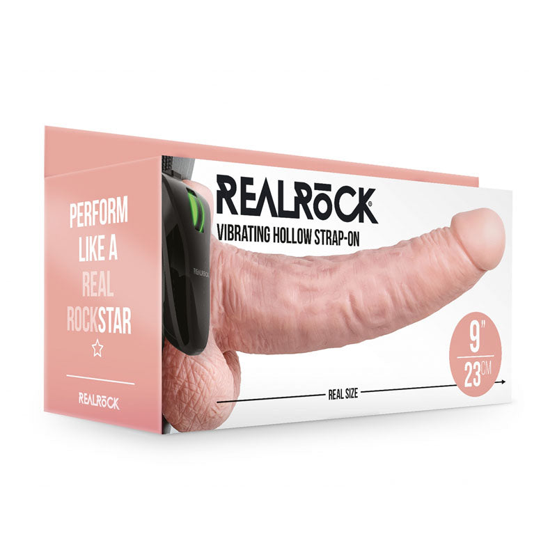 REALROCK Vibrating Hollow Strapon + Balls - 23cm  -  23 cm Vibrating Hollow Strap-On packaging with realistic design.