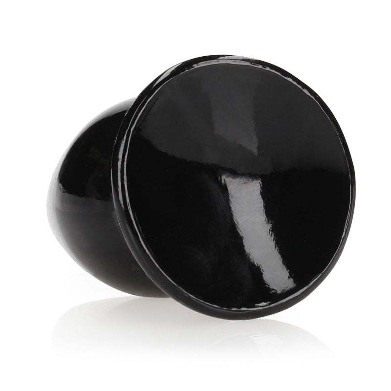 REALROCK clear anal plug, 9 cm (3.5'') butt plug with a smooth black finish and suction cup base.