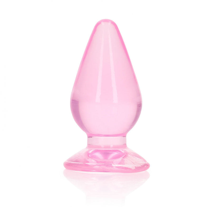 REALROCK 9 cm anal plug in a clear pink design with a suction cup base for hands-free use