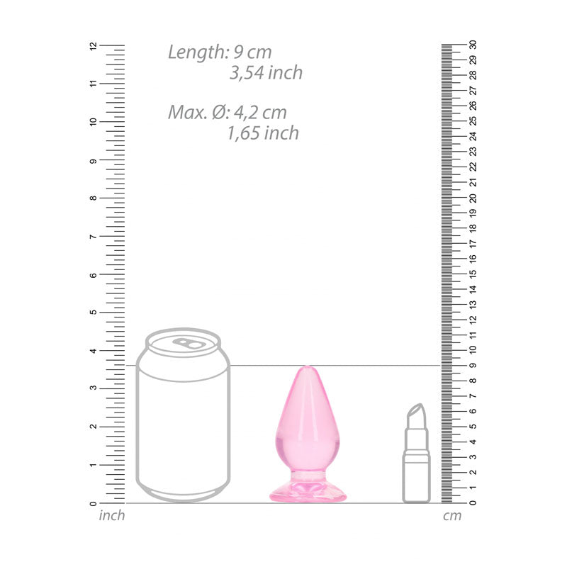 Diagram showing dimensions of 9 cm anal plug alongside a can and a bottle for size reference.