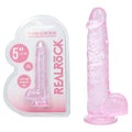REALROCK 5'' Crystal Clear Dildo with Balls -  - Clear  14.7 cm Dong in packaging and on display.
