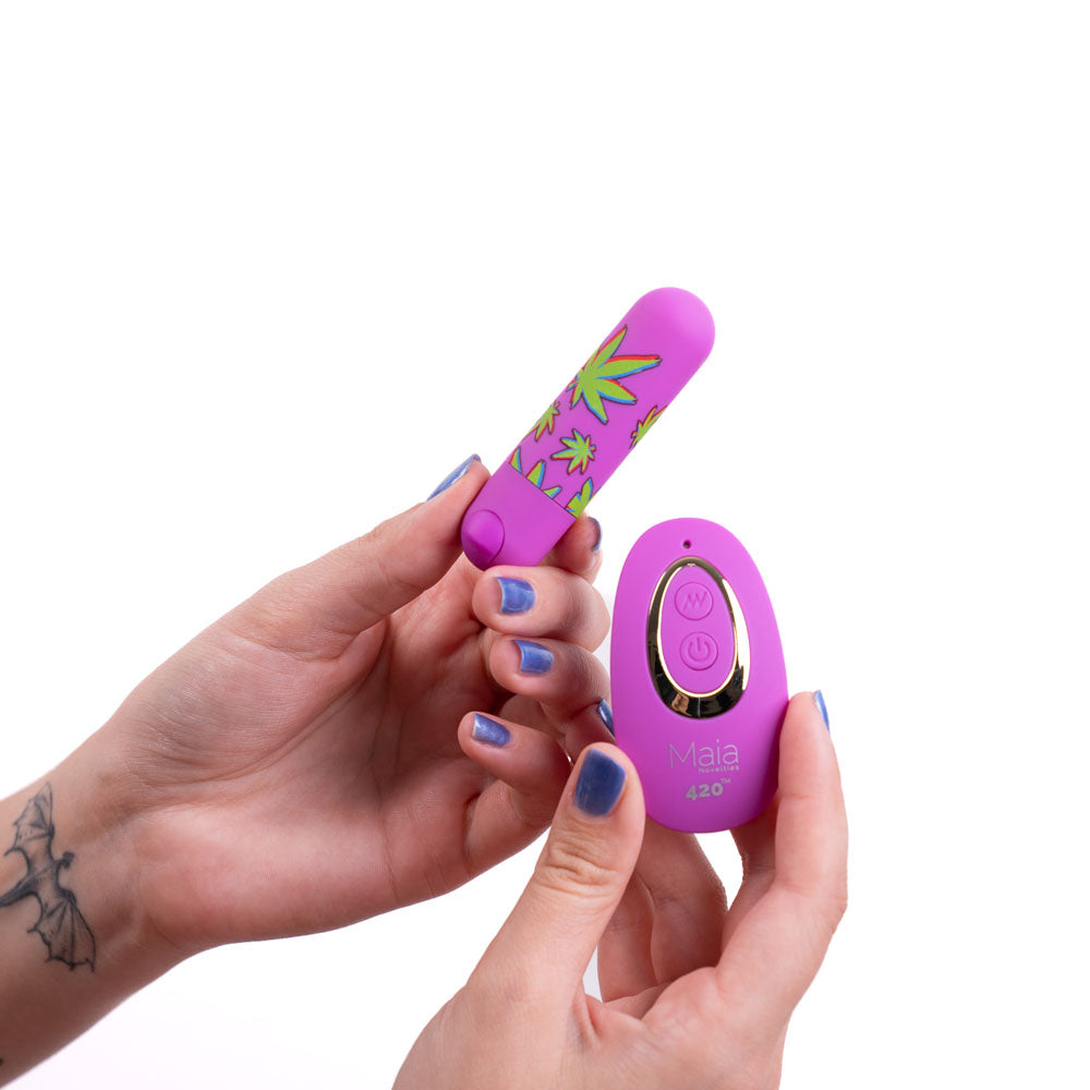 Maia JESSI 420 Remote -  7.6 cm USB Rechargeable Bullet with Wireless Remote in hands, showcasing its powerful design.