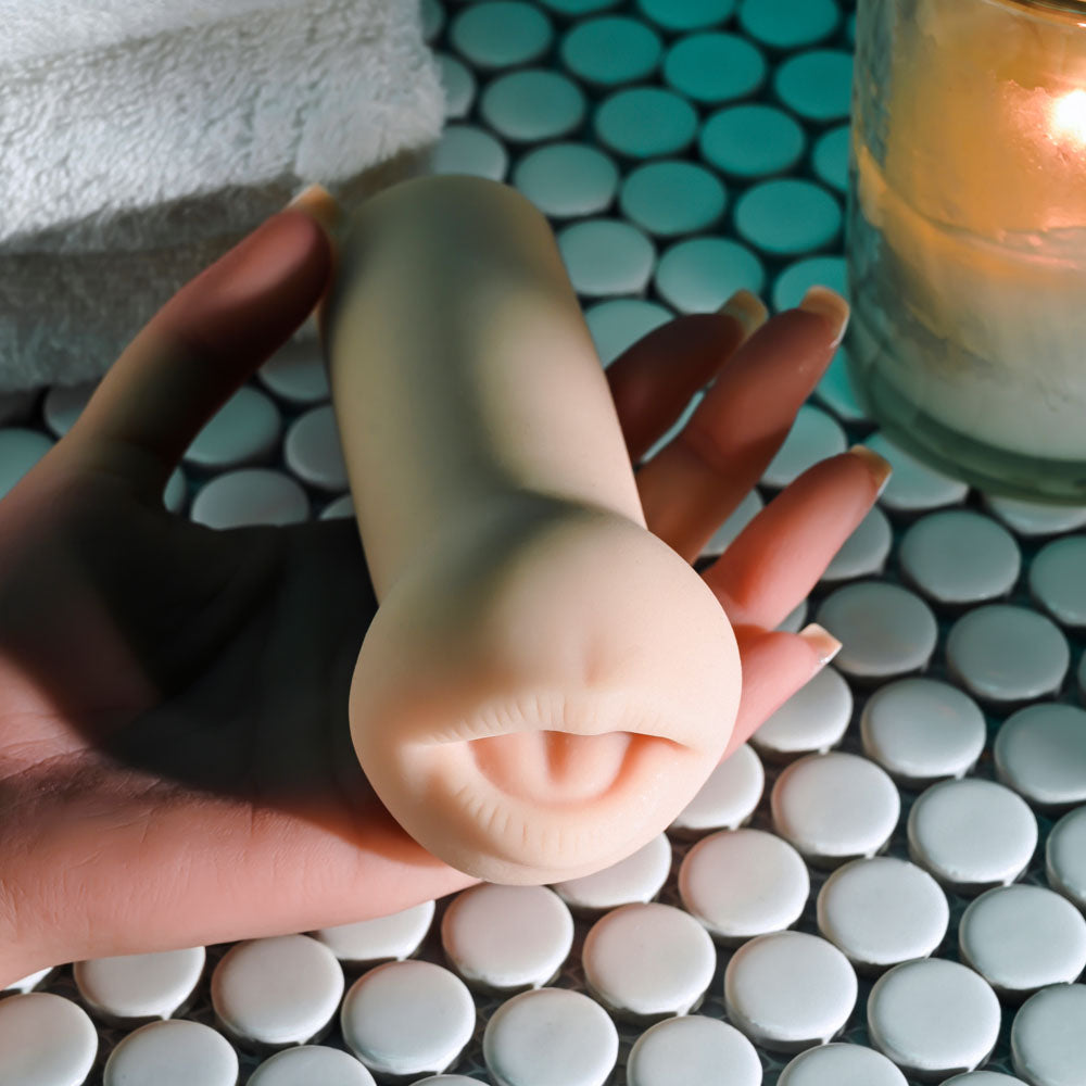 Selopa PARTY PACK - Light -  Strokers - Set of 3 - realistic stroker held in hand with candle and tiles in background.