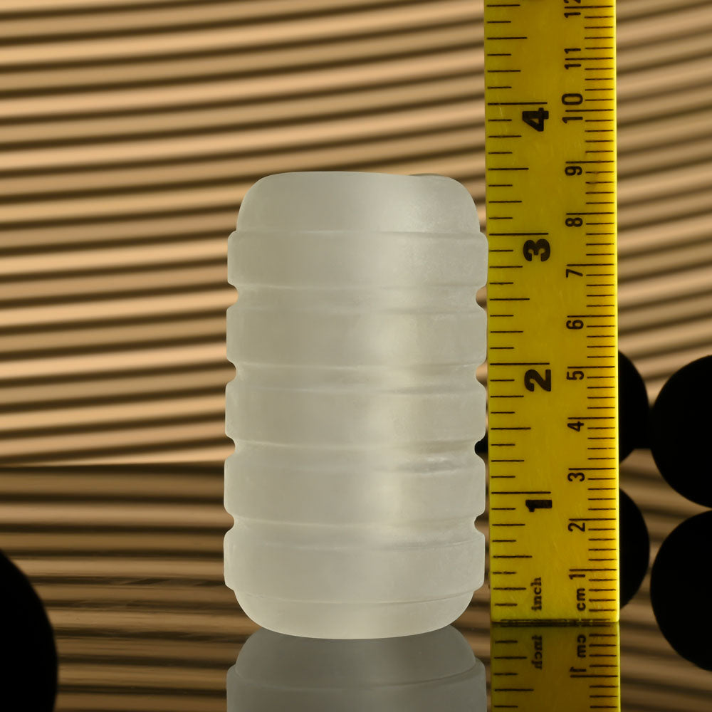 Selopa RING ME UP -  Stroker displayed next to a ruler for size reference, showcasing its soft pliable texture.