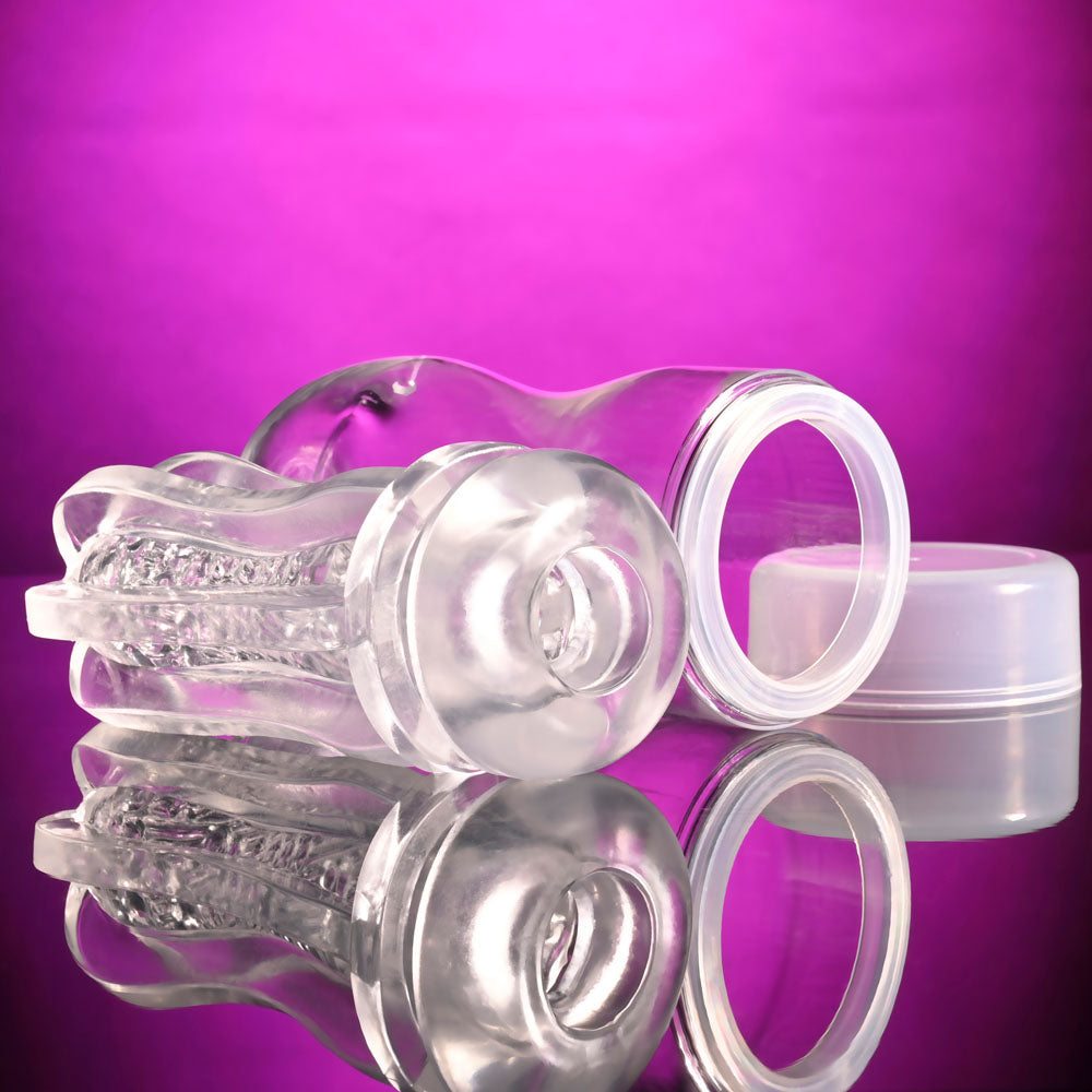 Selopa STROKE OF LUCK - Stroker with soft beaded inner channel, transparent design, and removable cap on a vibrant background.