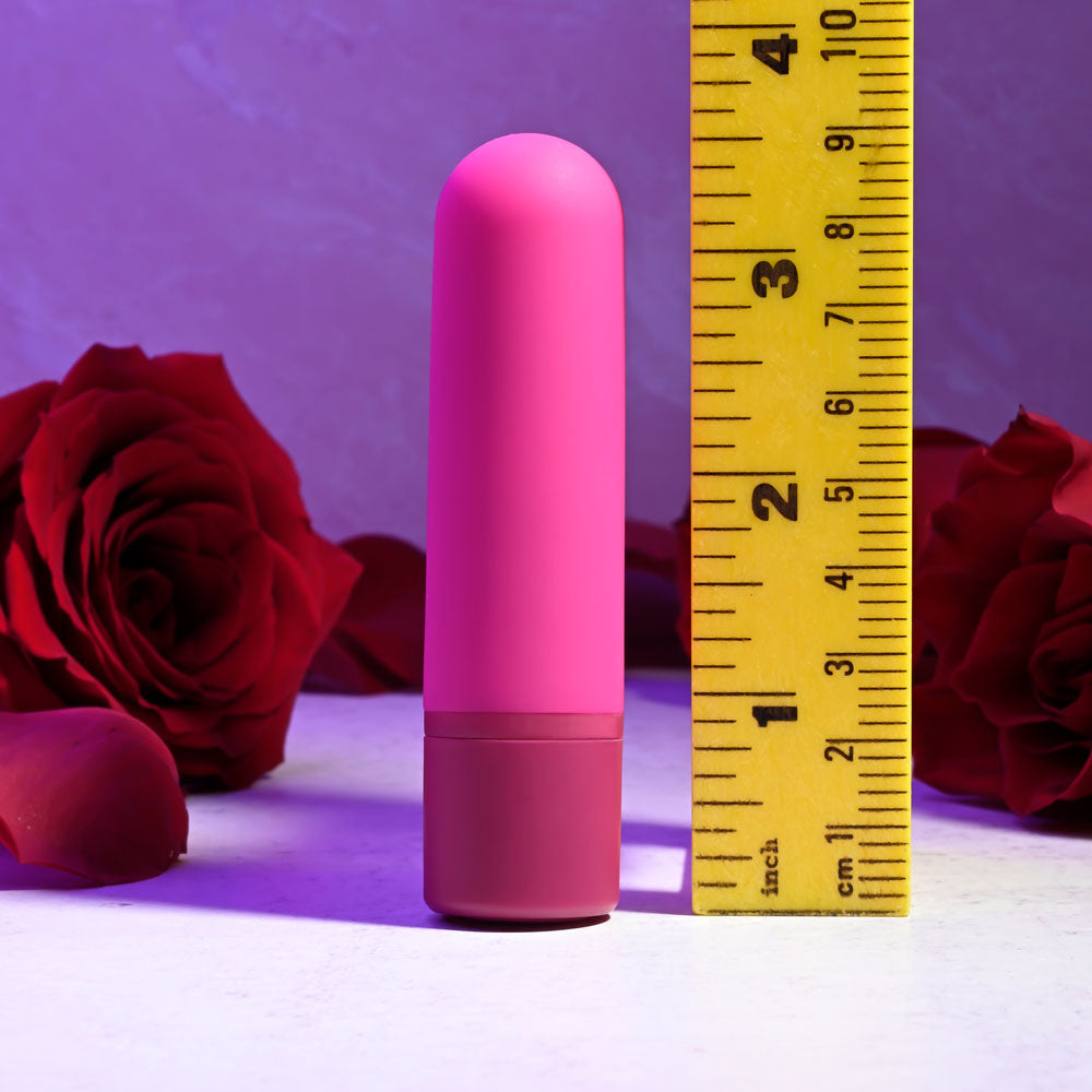 Selopa TINY TEMPTATION -  9.2 cm USB Rechargeable Bullet next to measuring tape and roses.