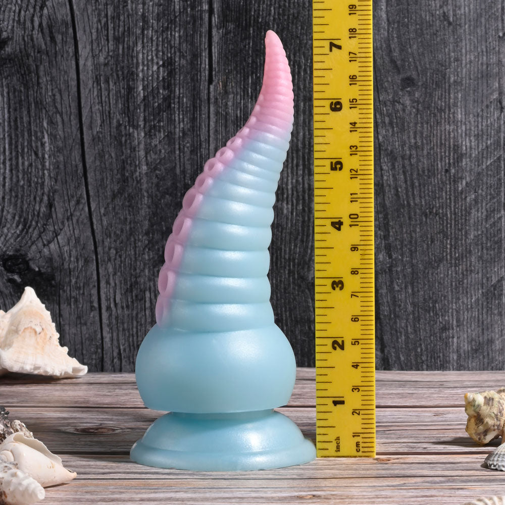 Selopa STUCK ON YOU - Blue/Pink 19 cm USB Rechargeable Vibrating Tentacle Fantasy Dildo next to a ruler for size reference.