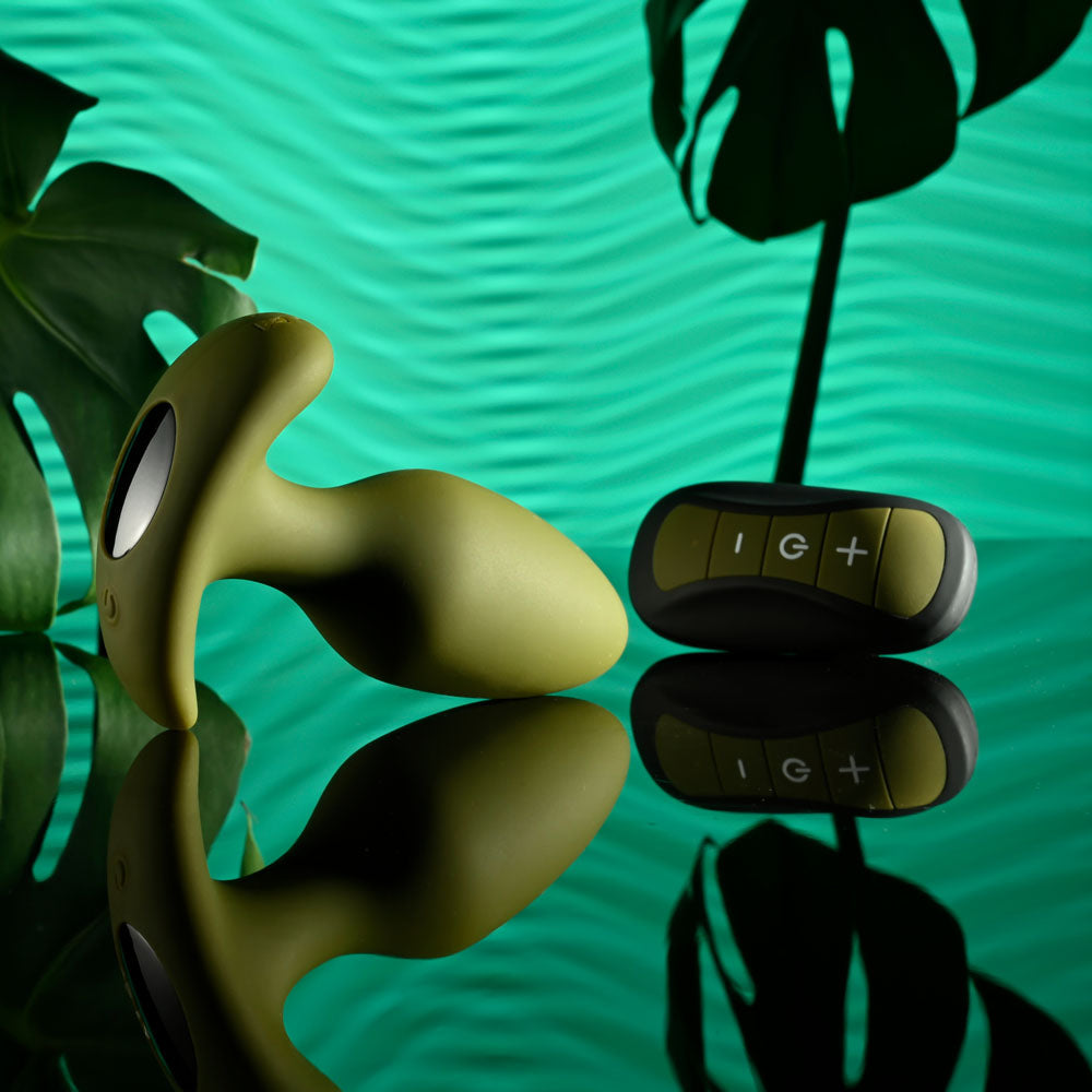 Selopa THE COLONEL - 10.1 cm USB Rechargeable Vibrating Butt Plug with Wireless Remote on reflective surface.
