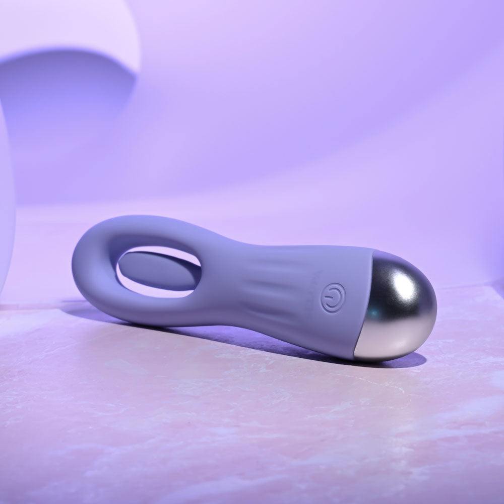 Selopa IN A FLAP - 15 cm USB Rechargeable Flicking Stimulator in a sleek design with silver finish and silicone handle.