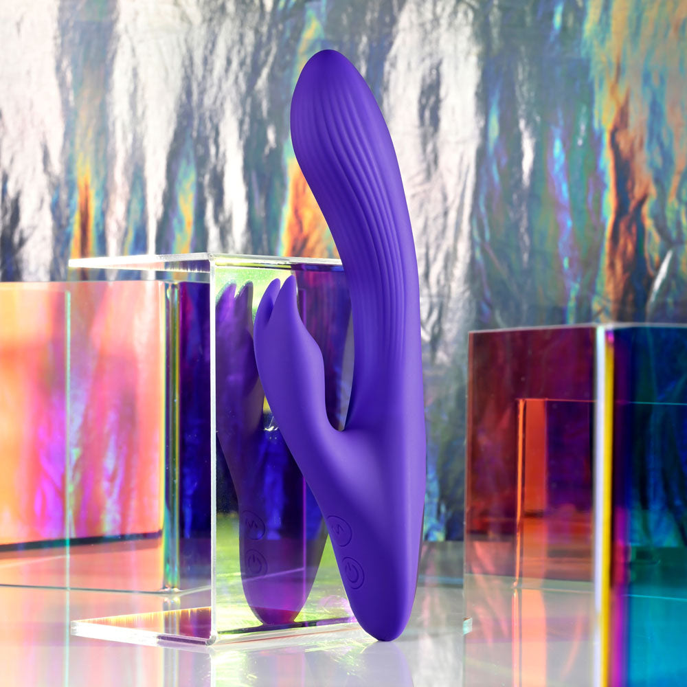Selopa POSEABLE BUNNY - 21 cm USB Rechargeable Poseable Rabbit Vibrator shown against a colorful reflective background.