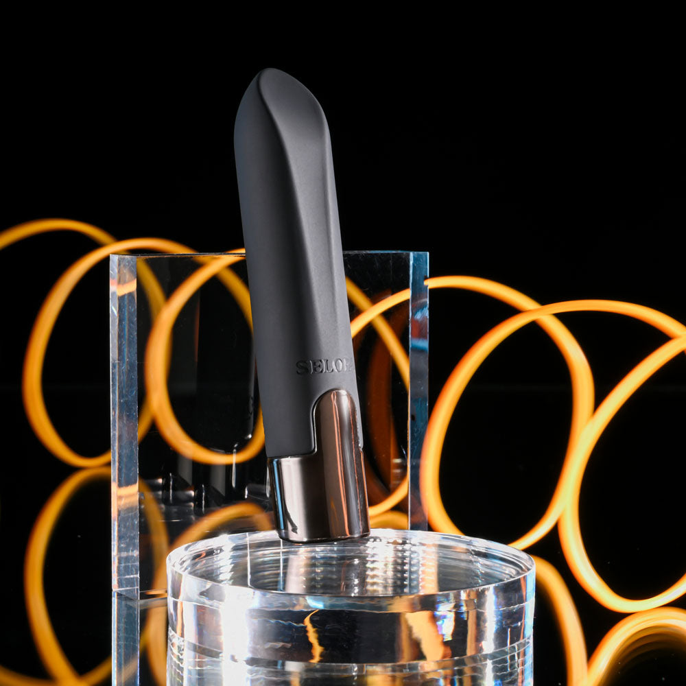 Selopa LITTLE BUDDY - 11.1 cm USB Rechargeable Vibrating Bullet displayed with artistic light pattern.
