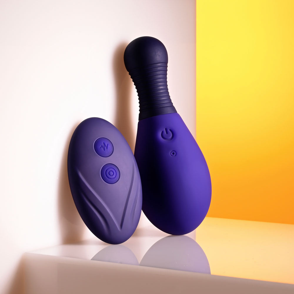 Selopa EGG ME ON -  10 cm USB Rechargeable Egg with Wireless Remote, smooth design and textured handle.
